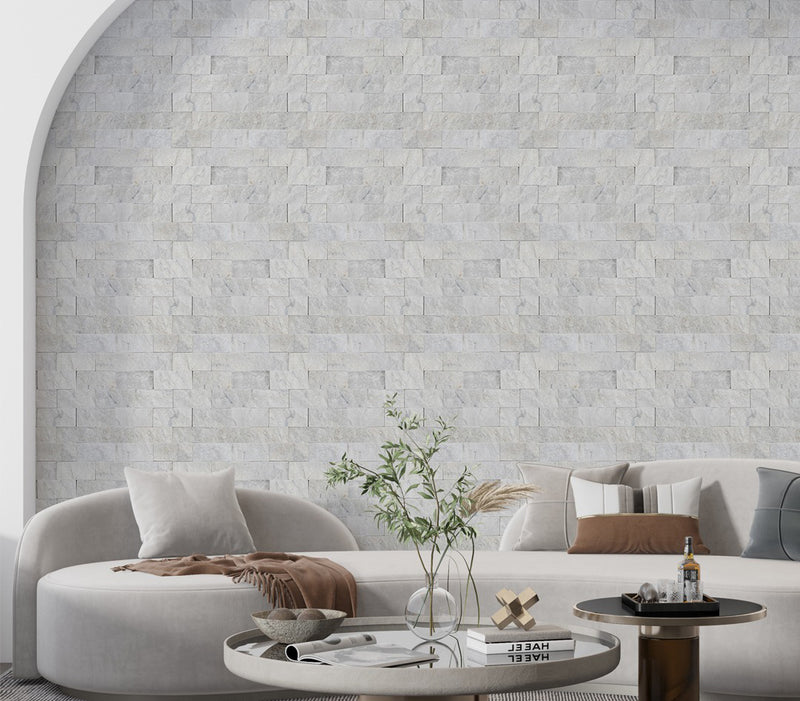 palia dolomite white ledger wall panel wall tile 6x24 split-face installed on living room wall
