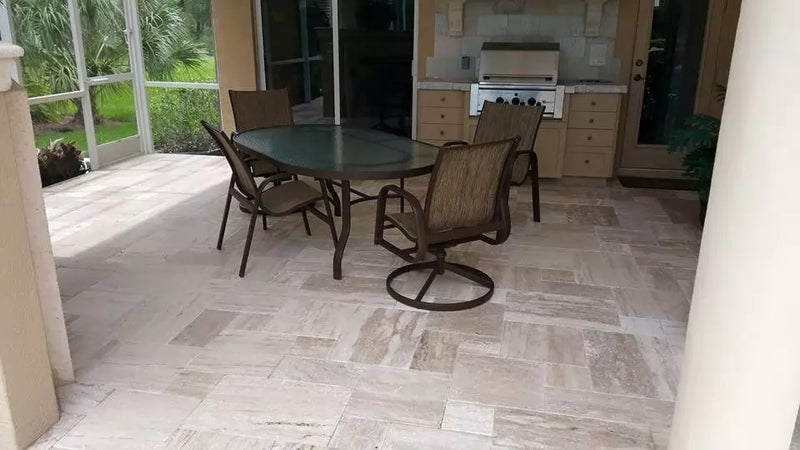 patara beige vein-cut travertine pavers tumbled pattern installed on sunroom floor