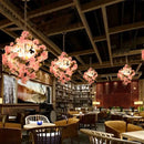 Pink cherry blossoms green plants pendant light dining room