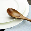 Polished dark brown wooden spoon soup and fork set dining room