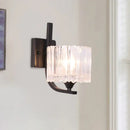 Post-modern black metal wall sconce with clear crystal shade bedroom