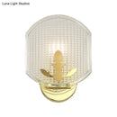 Post-modern gold wall sconce with clear lattice glass bedroom light