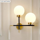 Post-modern white and brass sphere wall sconce bedroom light