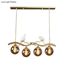 DecorBites™ Postmodern Iron Pendant Light with 4-Lights, Black/Gold Finish, Amber Ball Glass Shade, Bird Deco - Sprig Island