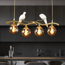 DecorBites™ Postmodern Iron Pendant Light with 4-Lights, Black/Gold Finish, Amber Ball Glass Shade, Bird Deco - Sprig Island