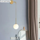 Postmodern black wall lamp with frosted glass globe for bedroom