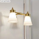 Postmodern brass and cream glass wall sconce bathroom vanity light
