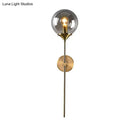 Postmodern brass pencil arm wall lamp with glass shade bedroom sconce