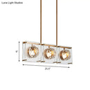 Postmodern gold and clear glass 3-light kitchen island light