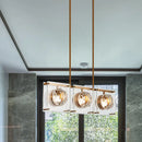 Postmodern gold and clear glass 3-light kitchen island light