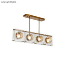 Postmodern gold and clear glass 3-light kitchen island light