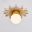 Postmodern gold sunburst ceiling light with cream glass shade bedroom