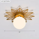 Postmodern gold sunburst ceiling light with cream glass shade bedroom