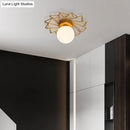 Postmodern gold sunburst ceiling light with cream glass shade bedroom