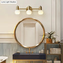 Postmodern gold swivel dome milk glass vanity light bathroom sconce