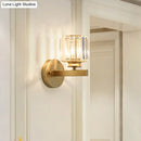 Postmodern gold wall lamp with prismatic crystal shade bedroom sconce