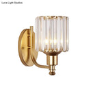 Postmodern gold wall lamp with prismatic crystal shade bedroom sconce