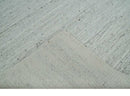 Premium Contemporary loop Pile Ivory Hand woven wool Area Rug