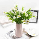 Purple and yellow daisy bouquet green plant synthetic flowers living room