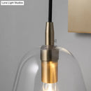 Retro style brass wall light with glass shade – bedroom sconce