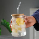 Ribbed glass cup set with bamboo lids and straws for dining room
