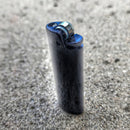 Survival Kit Lighter - Fire Starter outfitted with supplies.