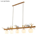 Rustic bamboo & white glass dome island light fixture dining room white bird deco
