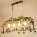 Rustic bronze iron bird cage chandelier dining room greenery light