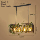 Rustic bronze iron bird cage chandelier dining room greenery light