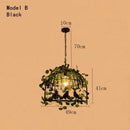 Rustic bronze iron bird cage chandelier dining room greenery light
