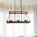 Rustic brown seeded glass island light with wooden trapezoid guard kitchen