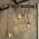 Rustic industrial wood and rope island pendant light dining room