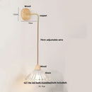 Rustic wood and brass wall light with clear glass pull chain switch