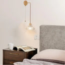 Rustic wood and brass wall light with clear glass pull chain switch