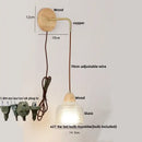 Rustic wood and brass wall light with clear glass pull chain switch