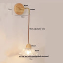 Rustic wood and brass wall light with clear glass pull chain switch