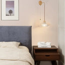 Rustic wood and brass wall light with clear glass pull chain switch