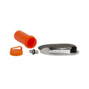 Orange container, black lid, gray mat with white tube on a white background