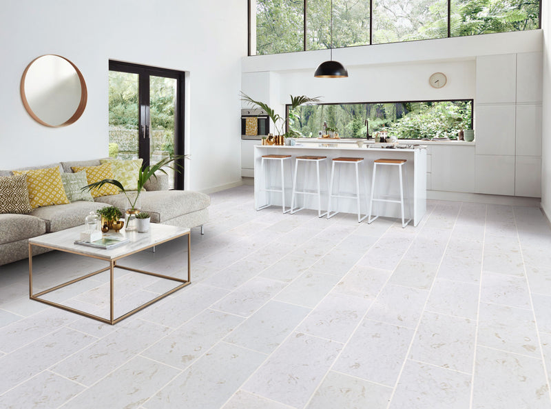 shell stone limestone brushed 12x24 bright modern kitchen wide view