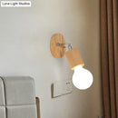 Simplistic wood and chrome open bulb mini rotating sconce bedroom light
