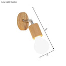 Simplistic wood and chrome open bulb mini rotating sconce bedroom light