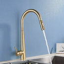 Sleek gold swivel kitchen faucet with pull down sprayer