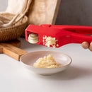 Sleek red manual press garlic crusher kitchen grinder