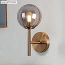 Sleek round wall lighting in red green & amber – bedroom sconce light