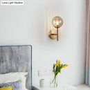 Sleek round wall lighting in red green & amber – bedroom sconce light