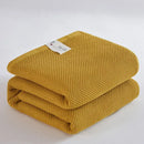 Soft beige cotton honeycomb towel blanket for living room couch