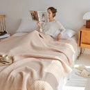 Soft beige cotton honeycomb towel blanket for living room couch