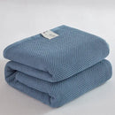 Soft beige cotton honeycomb towel blanket for living room couch