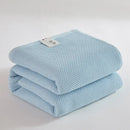 Soft beige cotton honeycomb towel blanket for living room couch