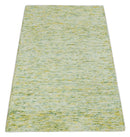 Custom Made Solid Green And Ivory Hand Tufted Natural Wool Area Rug